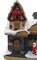 Festive Cottage with Santa Claus. Christmas Village Wizardi F07-N1-11-601